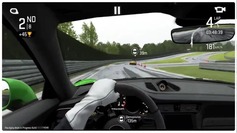 An interior view of a driving simulator showing controls and screens
