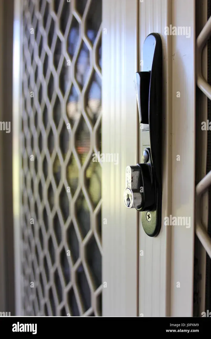 A close-up view of a high-tech security lock mechanism on a storage cabinet.