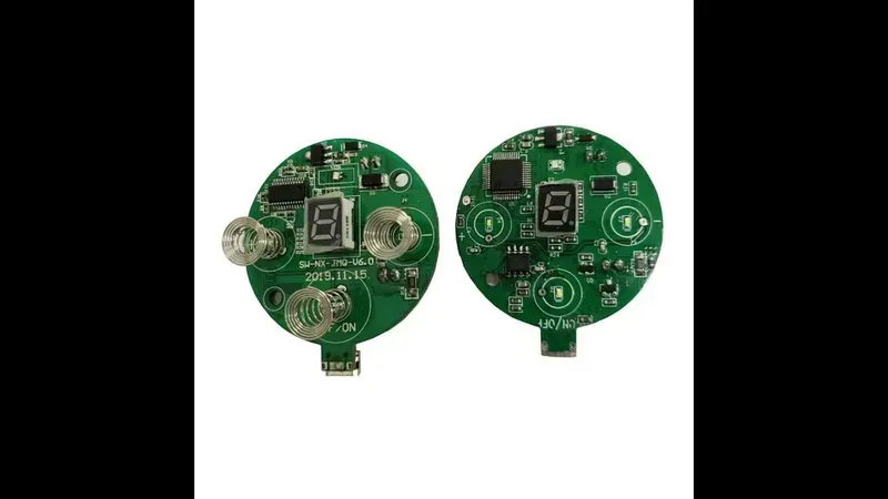 A close-up of a PCB board designed for a shared fascia gun