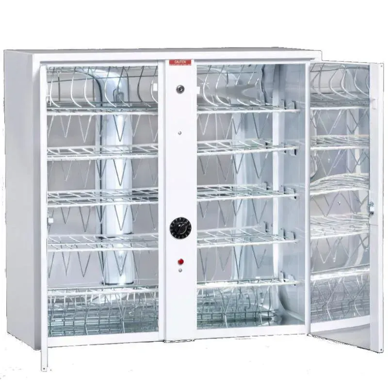 A user operating a phone sterilization cabinet