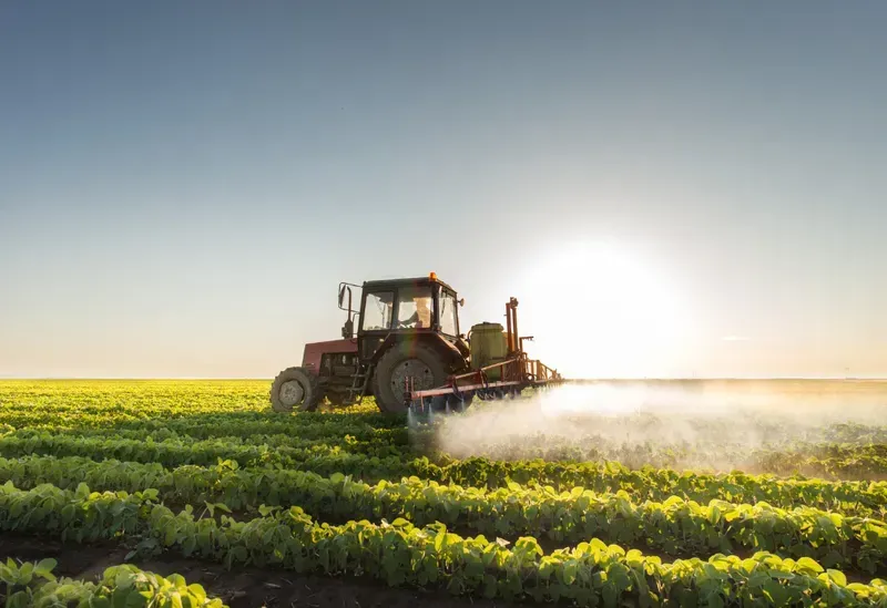 Agricultural machinery working in a field