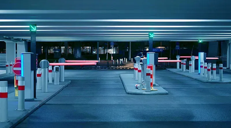 A vehicle entering a parking lot with an ALPR system scanning its license plate
