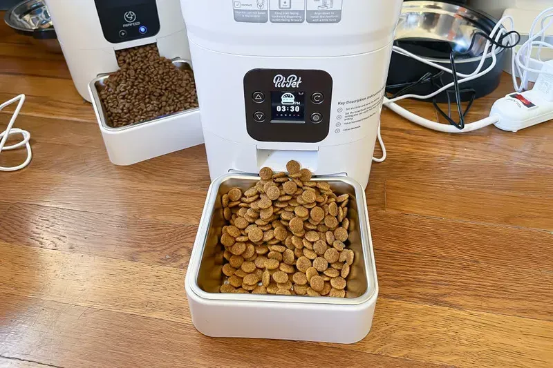 Automated food dispensing system in a shared breakfast cabinet.