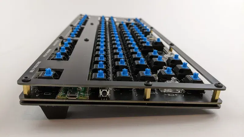 A PCB board designed for a shared keyboard.