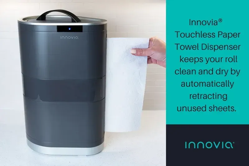 A touchless tissue dispenser in operation.