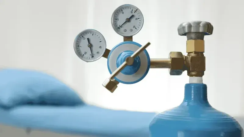 Oxygen cylinders being managed in a hospital setting