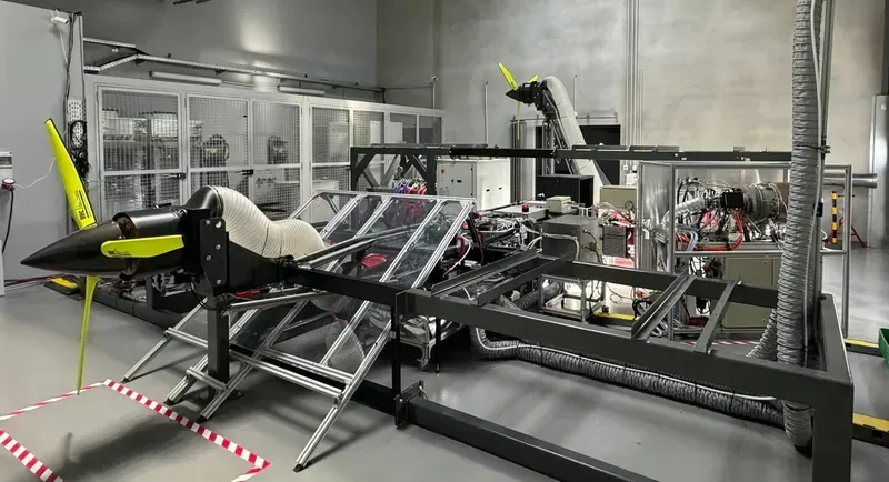 Engineer assembling an avionics system prototype