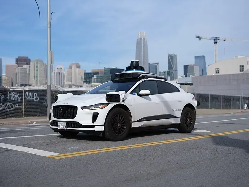 An autonomous driving car navigating a city street