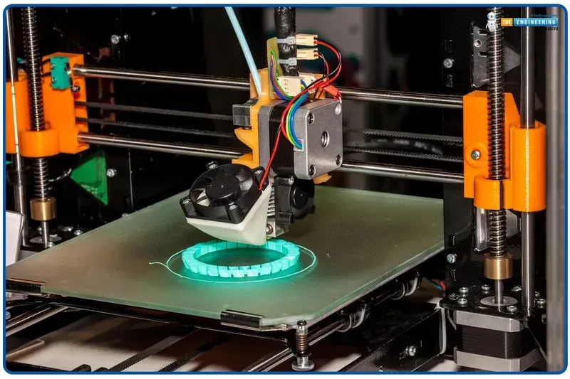 An engineer operating a rapid prototyping machine for PCB development