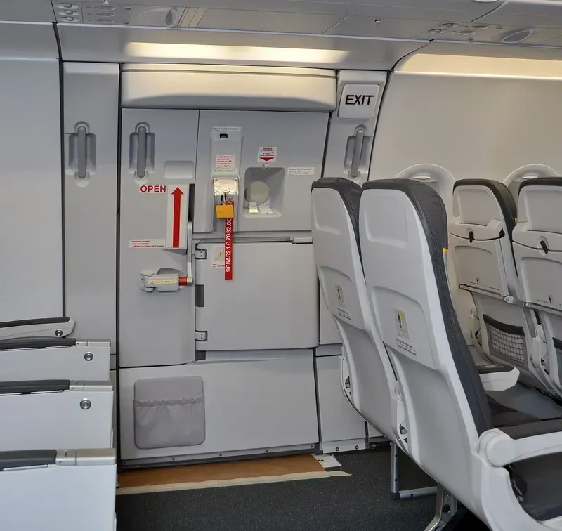 An image of an aircraft cabin door control system mechanism