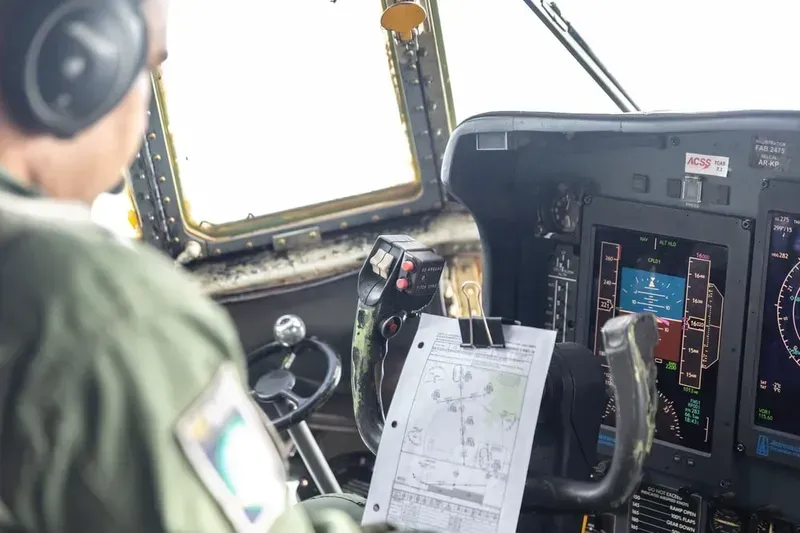 Engineers performing tests on an avionics system