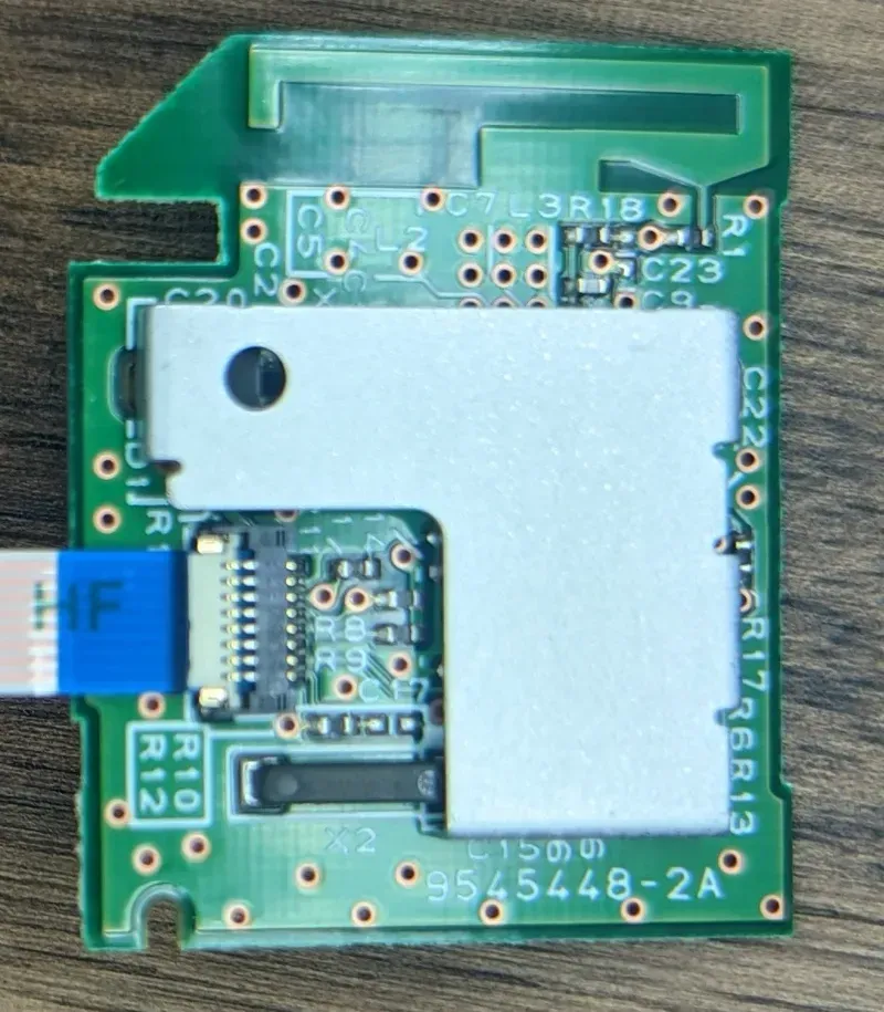 A close-up view of a blood pressure monitor motherboard
