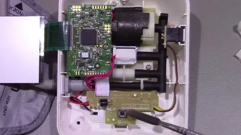 Various electronic components on a blood pressure monitor motherboard