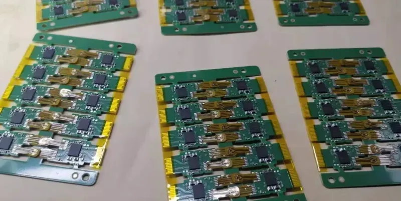 Engineers working on high-frequency signal routing and impedance control for optical module PCB