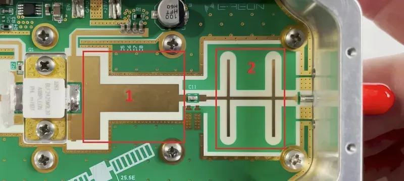 An engineer analyzing impedance matching on an RF PCB using specialized equipment