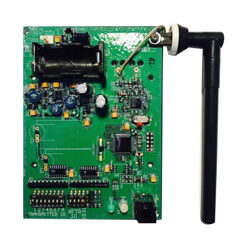 Automated SMT machine placing components onto a wireless repeater PCB during assembly