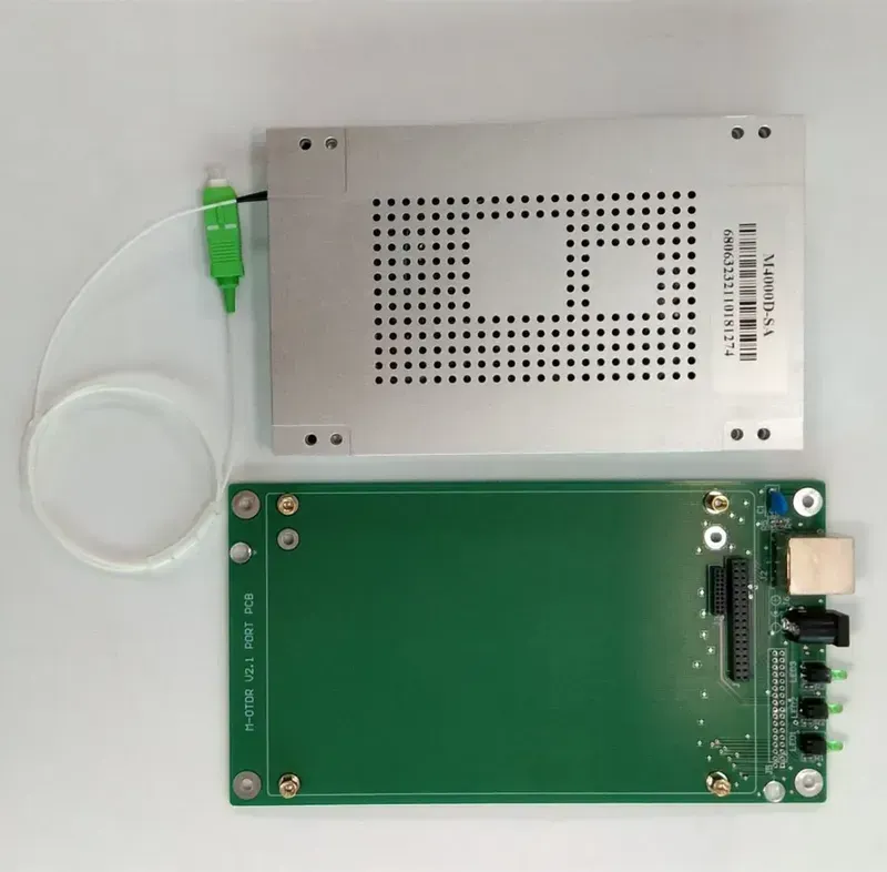 A close-up of a PCB board designed for optical communication monitoring systems