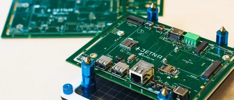 A PCB board integrated with IoT connectivity modules like Wi-Fi and Bluetooth