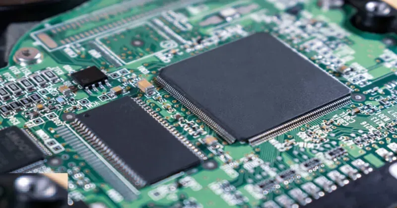 A detailed close-up of a sonar signal processing board, showing components.