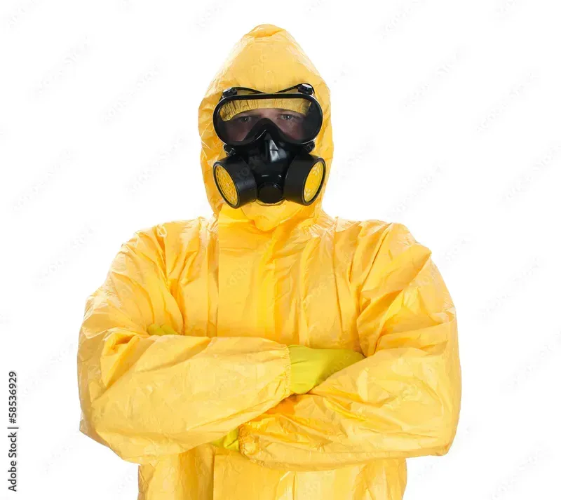 A person wearing a chemical protective suit
