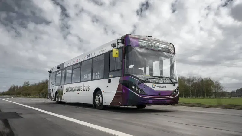 An autonomous bus undergoing road testing in a real-world environment