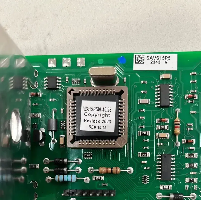 Various electronic components arranged on a security alarm board