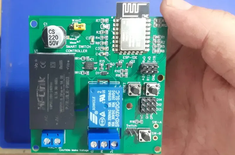 Internal components of a smart lighting control board, showing microcontroller, sensors, and communication modules