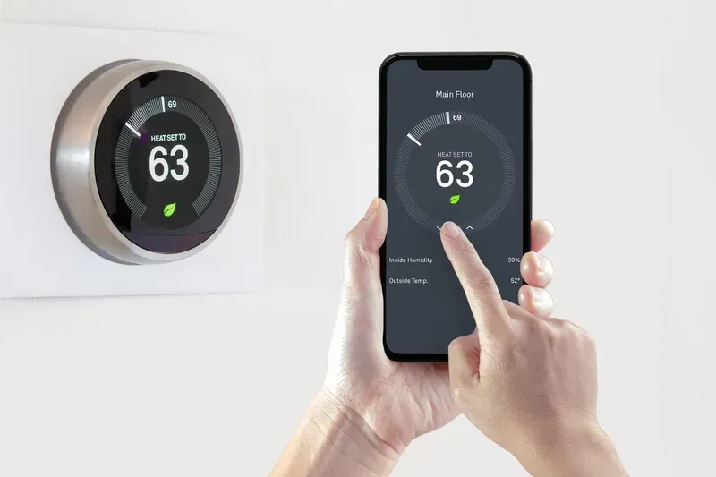 The internal electronic components of a smart thermostat or an air quality monitor device.