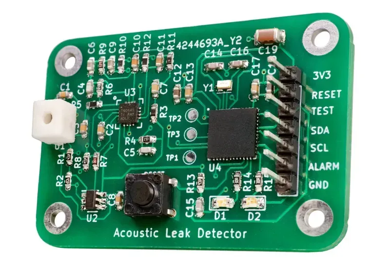 Engineer designing water leak detector PCB layout