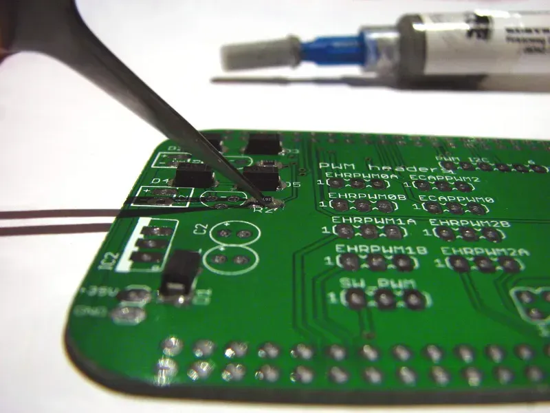 Automated SMT process soldering components onto a PCB