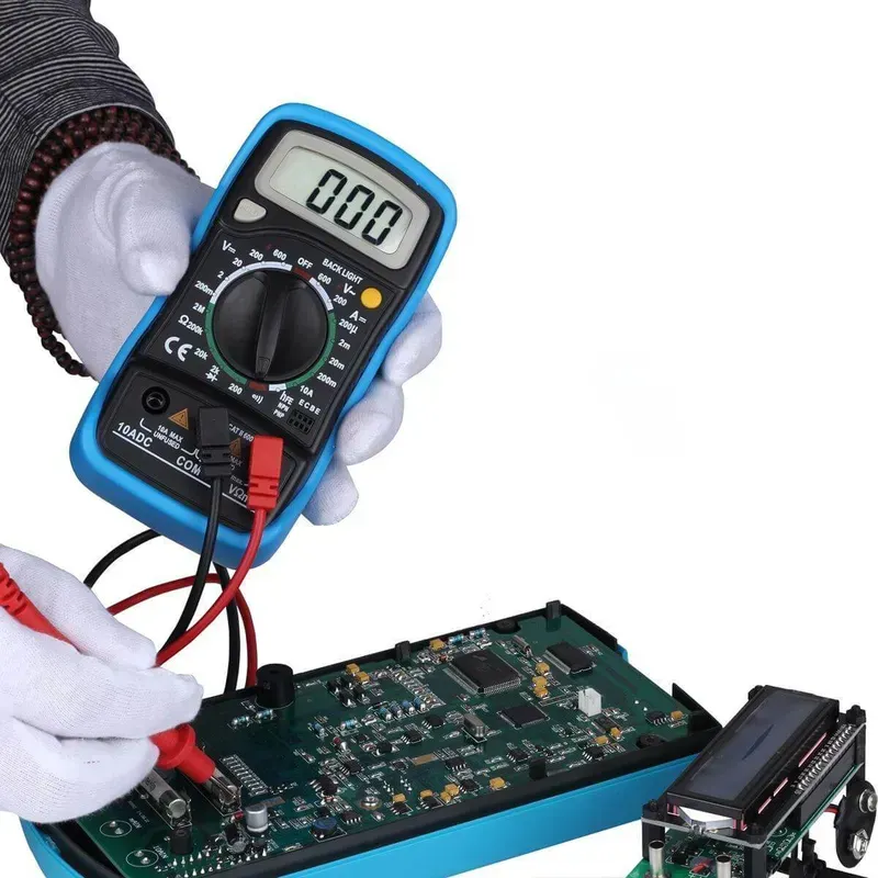 Testing voltage and current on a PCB.