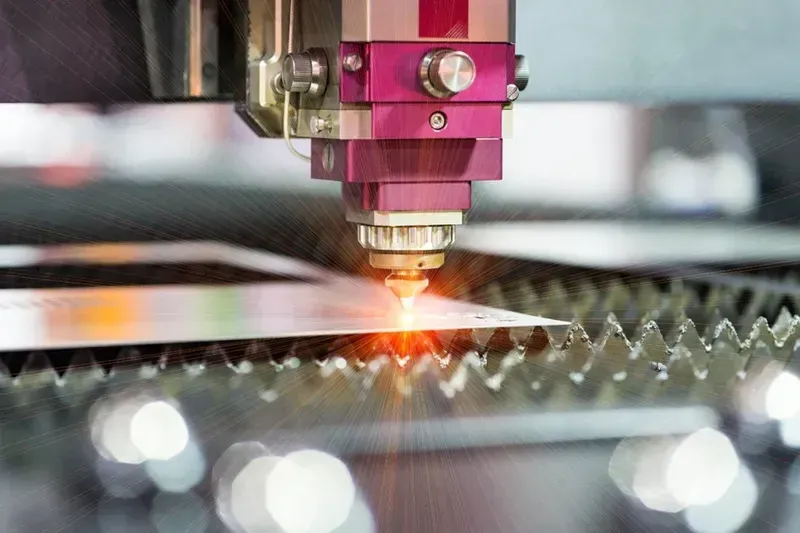A close-up view of laser drilling on a PCB